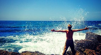 Freedom - man standing on the seashore