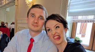 Young couple making funny face at a Polish wedding
